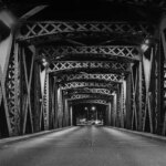 LEGOLAND Florida: A black and white photo of a bridge at night.