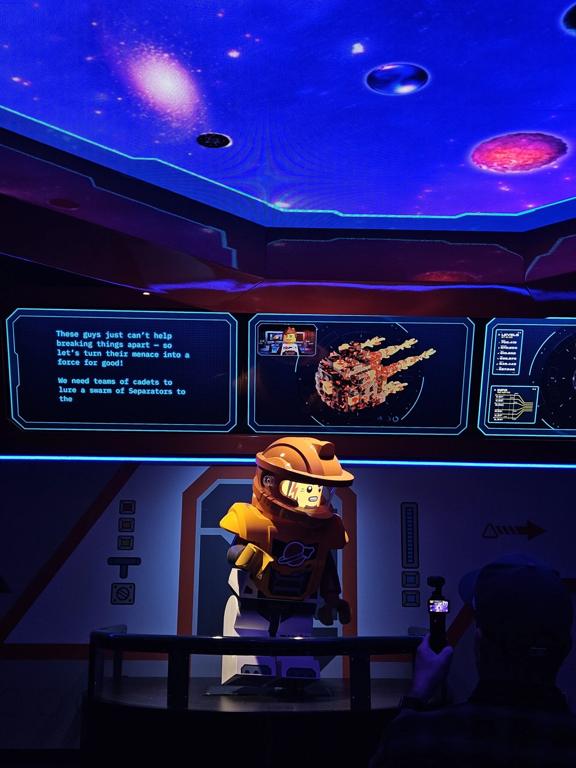 Inside Galacticoaster at LEGOLAND Florida: What Families Can Expect 6 Robot animatronic in the Galacticoaster pre show at LEGOLAND Florida