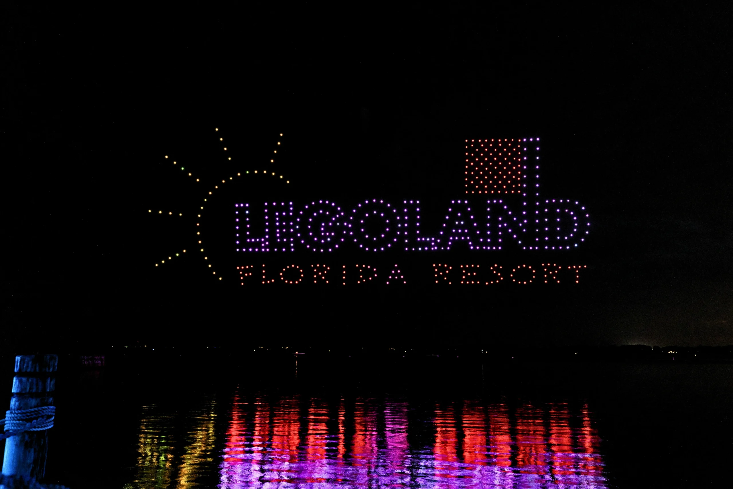 New for 2026: Brick or Treat Street at LEGOLAND Florida 6 Drones forming the LEGOLAND Florida Resort logo above the lake at night
