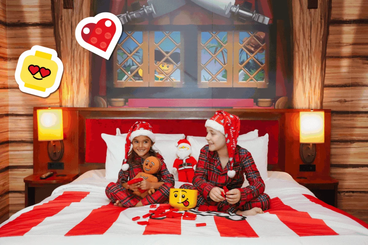 LEGOLAND Florida Christmas Bricktacular 2026: LEGO Santa Takes to the Sky 14 Family wearing holiday pajamas in a LEGO themed hotel room at LEGOLAND Florida