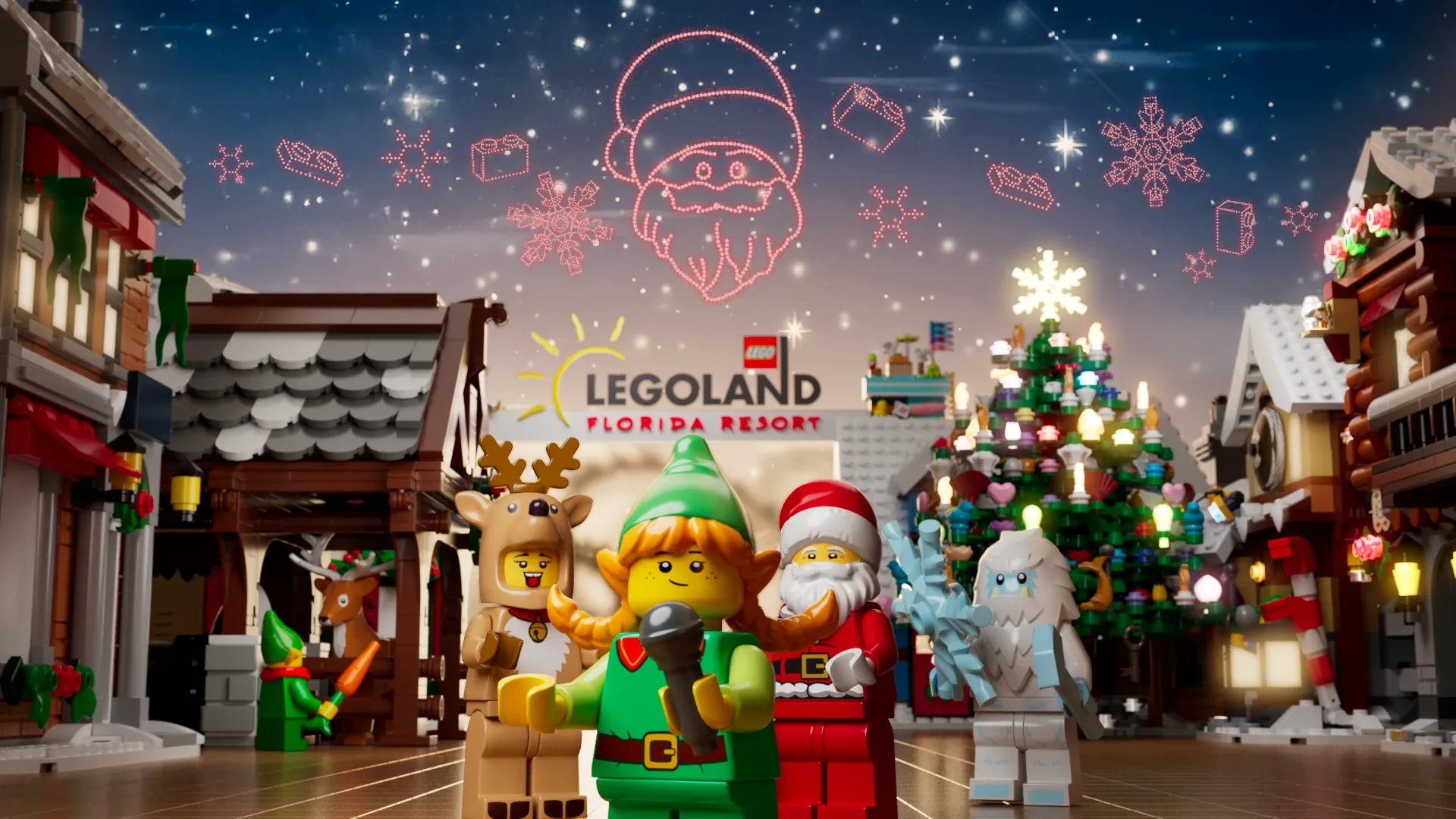 LEGOLAND Florida Christmas Bricktacular 2026: LEGO Santa Takes to the Sky 3 LEGO Santa and holiday characters beneath a festive drone display at LEGOLAND Florida