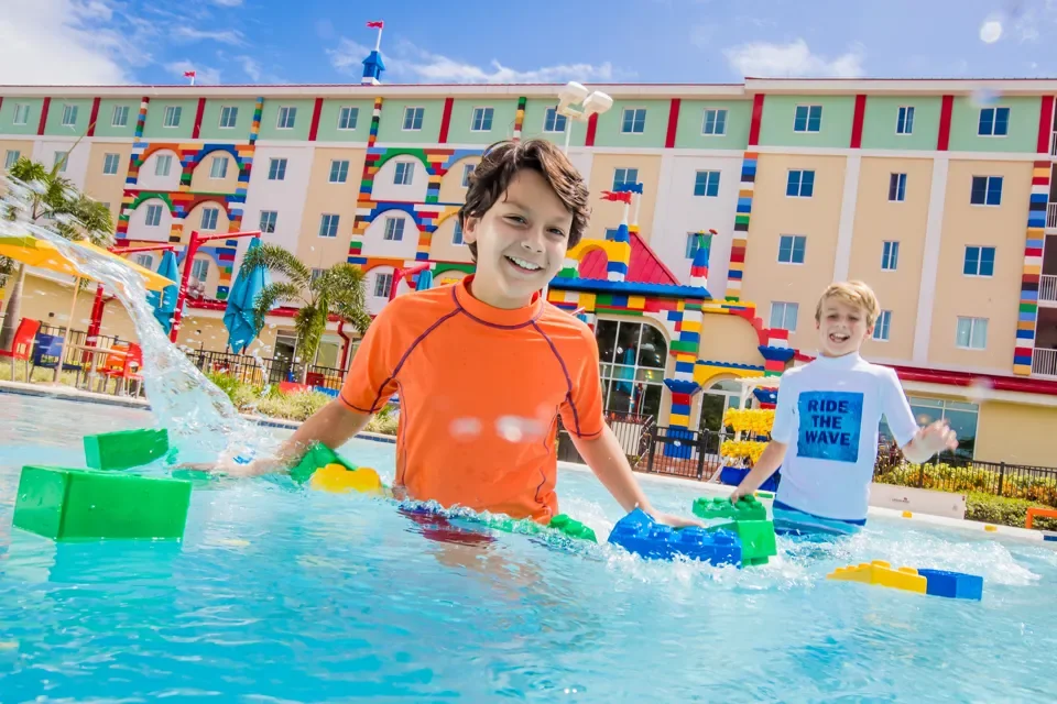 LEGOLAND Florida Summer Planning Guide 2026 5 Kids playing in the LEGOLAND Hotel pool