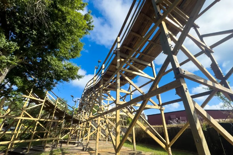 Coastersaurus Rebuild Preserves a Classic at LEGOLAND Florida 1 Coastersaurus beams seen from ground level at LEGOLAND Florida